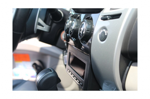 Переходная рамка для Mitsubishi Pajero Sport 2008 - для переноса бортового компьютера вниз